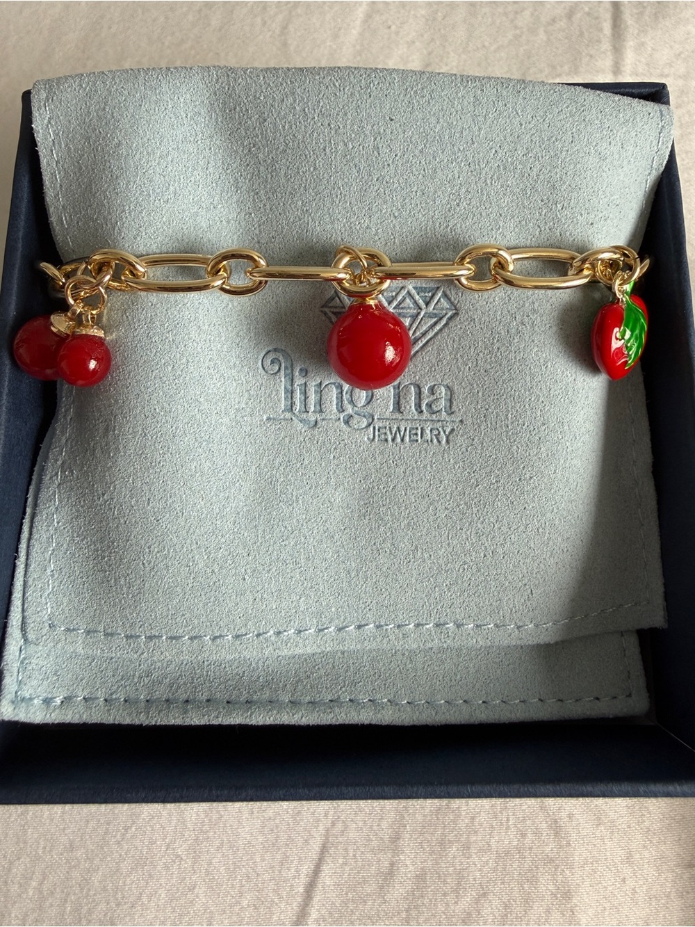 Lingna Gold Chain Bracelet with Red Fruit Charms